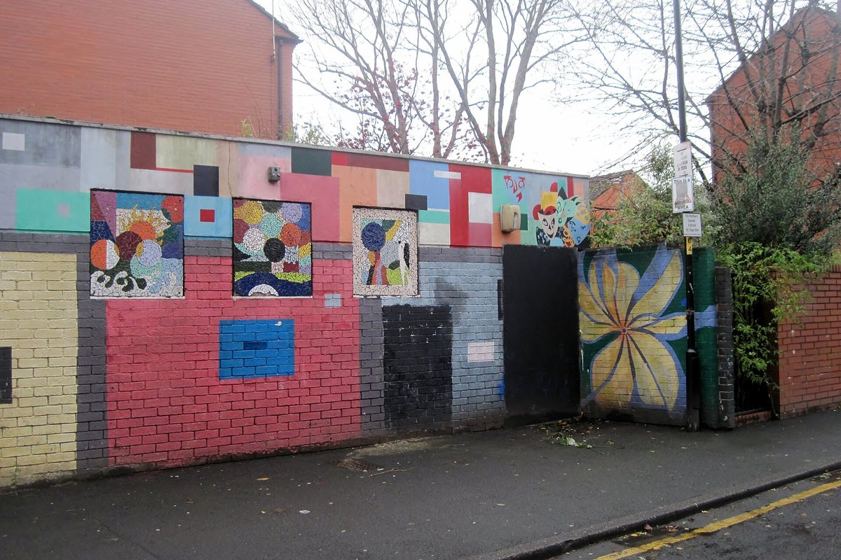 A colorful wall mural in Manchester’s Northern Quarter