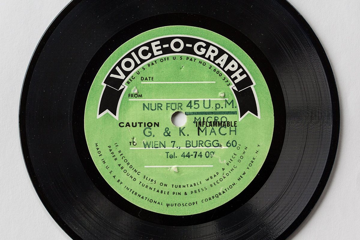 The green label of a vintage Voice-O-Graph record